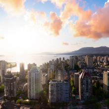 The view of a city with a sunrise